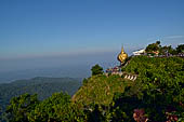 Myanmar - Kyaikhtiyo, several other stupas and shrines scattered on the ridge at the top of mount. 